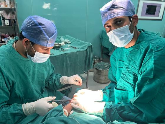 Dr. Ankur Gupta training a junior doctor